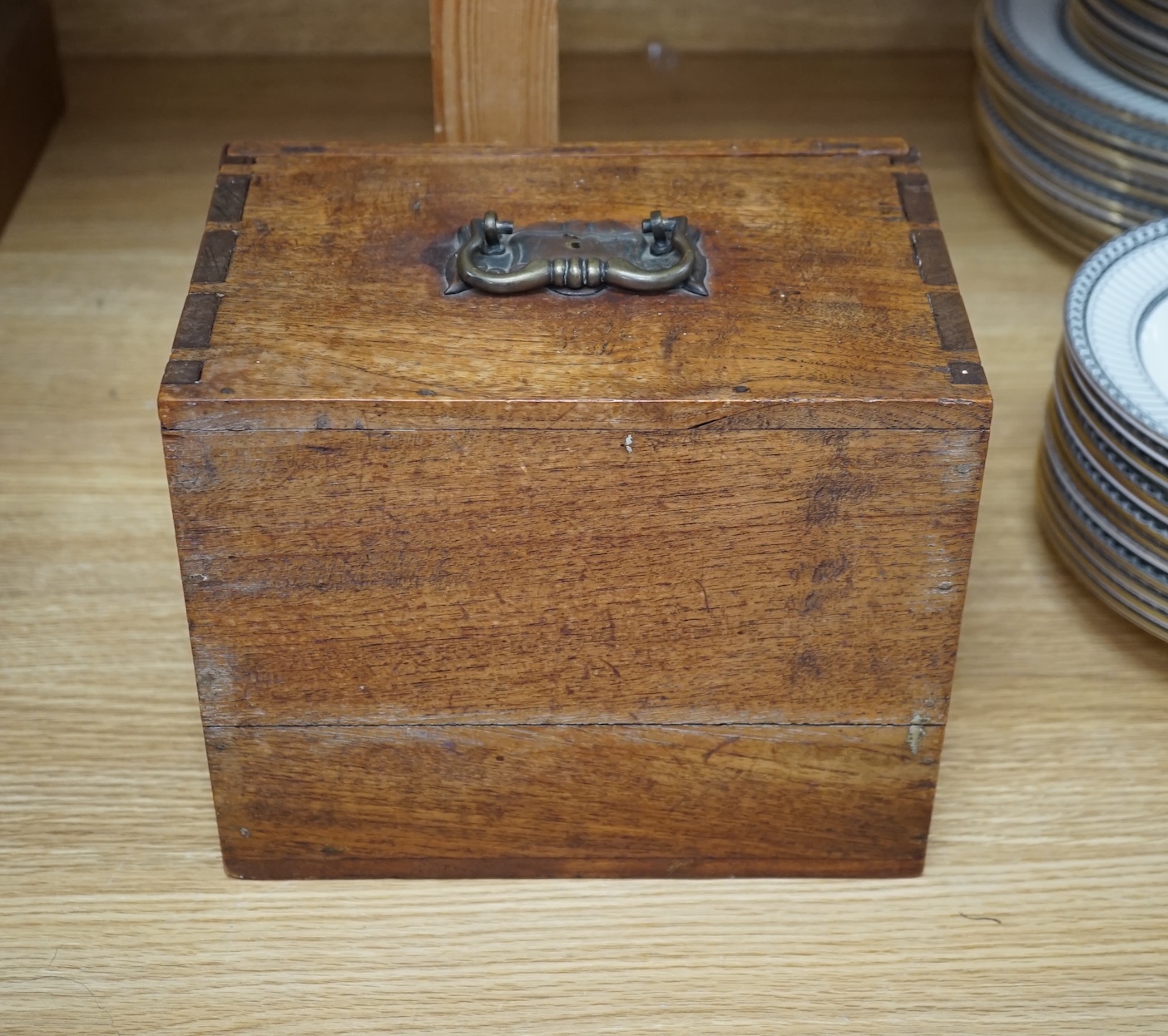 A Chinese boxed bone Mah jong set with five drawers, 19cm high. Condition - poor to fair, case damaged